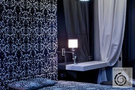 фото дизайна интерьера спальни в черном цвете