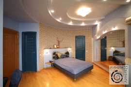 фото дизайна интерьера спальни с круглой стенкой